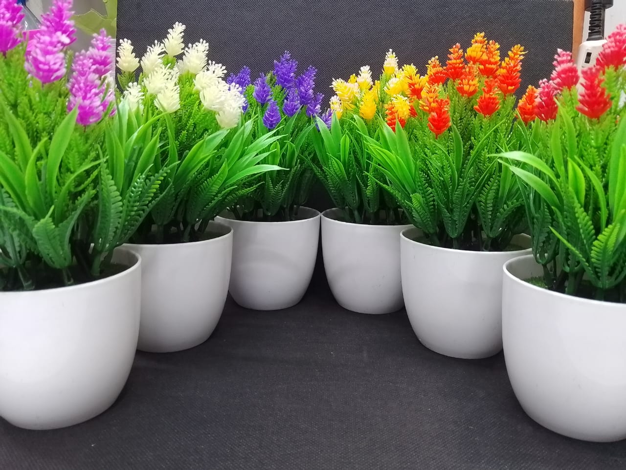 Artificial/ faux home decorative flower with vase (home decor/office table/bathroom decor/bedside table decor)Artificial flowers/plants add a luxurious touch to your interior setting and the same time
