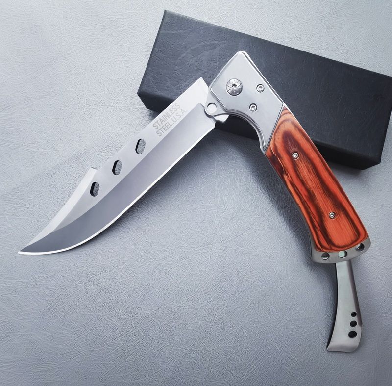 Folding knife for tourism, hunting, and fishing. Tough swiss outdoor knife with a nylon sheath.