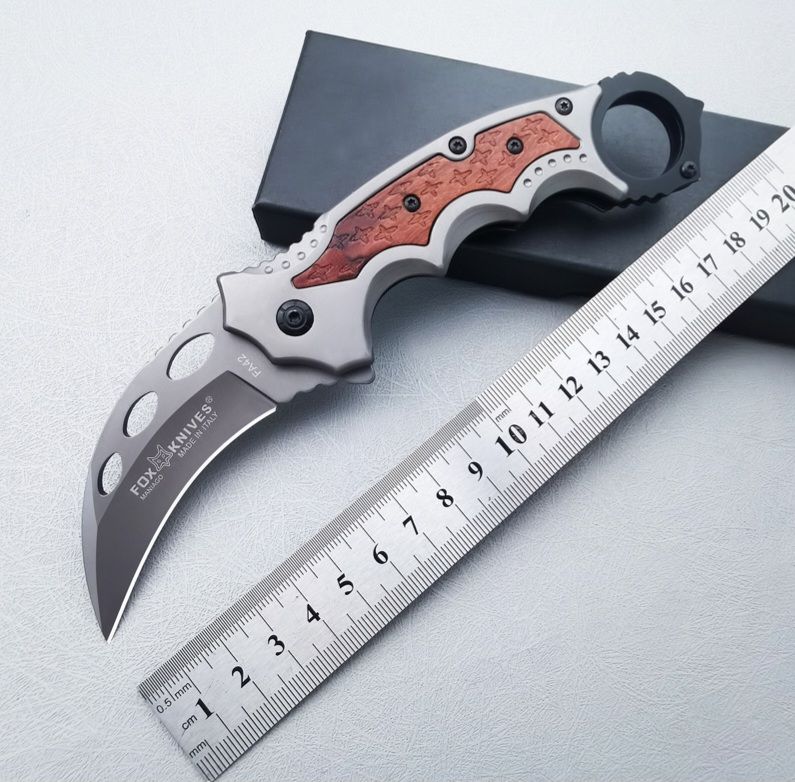 Stainless steel outdoor claw folding knife.
