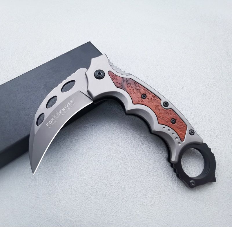 Stainless steel outdoor claw folding knife.