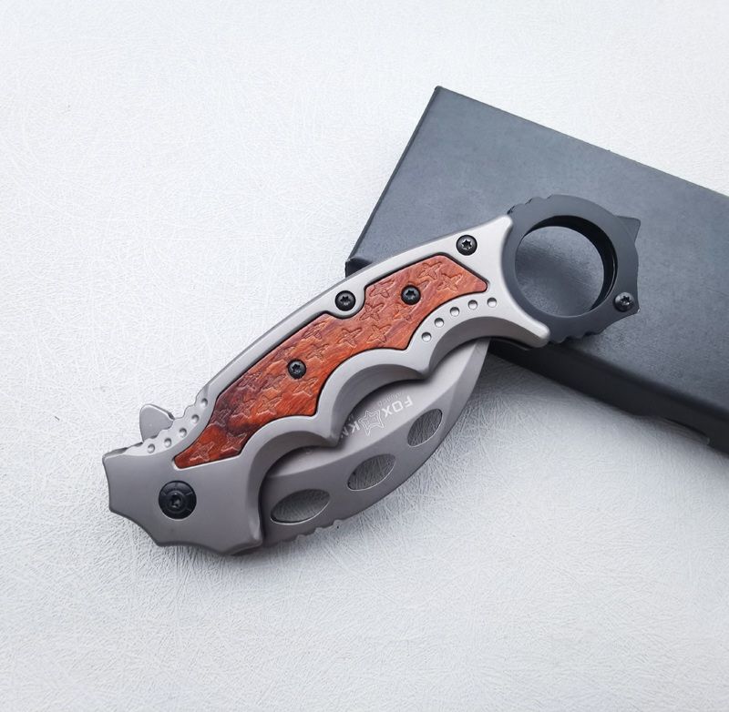 Stainless steel outdoor claw folding knife.