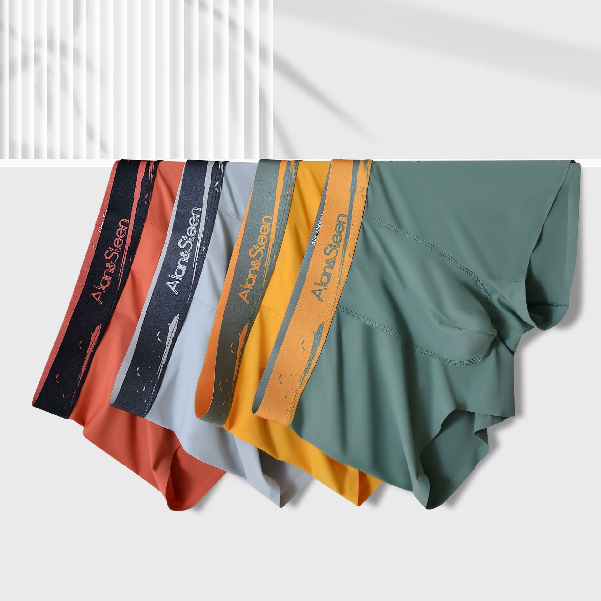 Africa new multi-color contrast color seamless men's ice silk underwear male summer pure color breathable boys boxers mid-waist boxer shorts wholesale