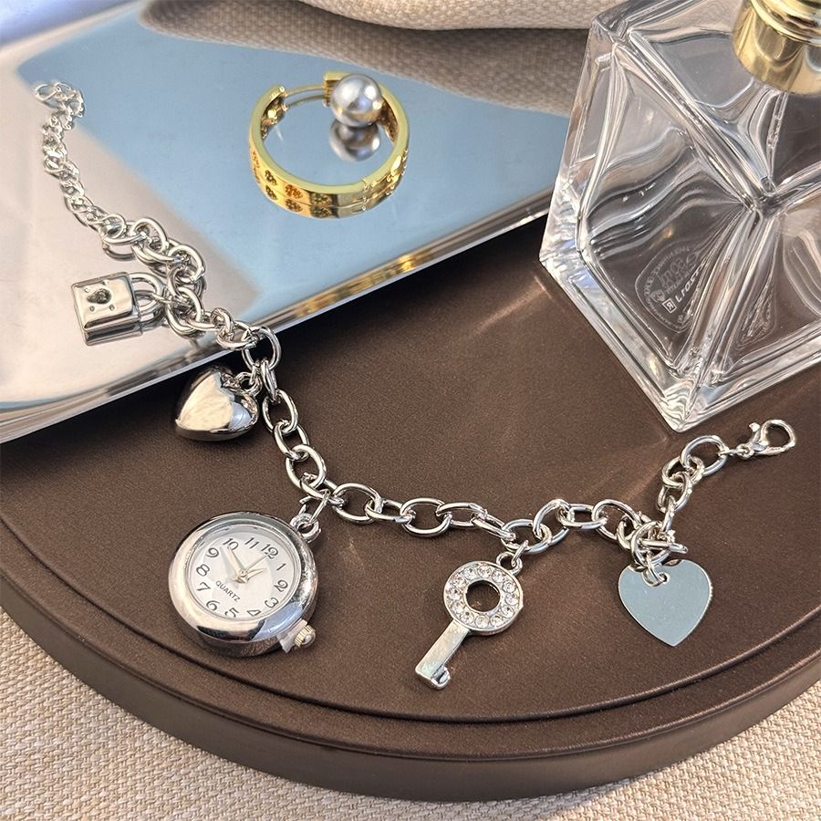 European and American love lock jewelry, personality, full of diamonds, peach heart, gold and silver bracelets, watches, women's diamond-set design, bracelets, quartz watches