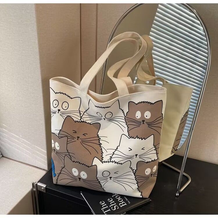 Tote bag Large capacity 2025 New style Cute kitten pattern Large capacity Single-shoulder canvas bag Foldable Women Girl Fashion School Shopping Leisure Washable