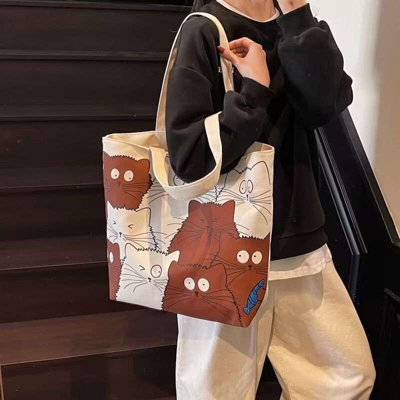 Tote bag Large capacity 2025 New style Cute kitten pattern Large capacity Single-shoulder canvas bag Foldable Women Girl Fashion School Shopping Leisure Washable