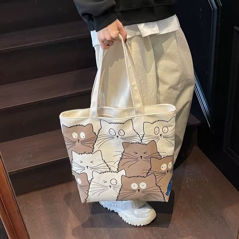 Tote bag Large capacity 2025 New style Cute kitten pattern Large capacity Single-shoulder canvas bag Foldable Women Girl Fashion School Shopping Leisure Washable