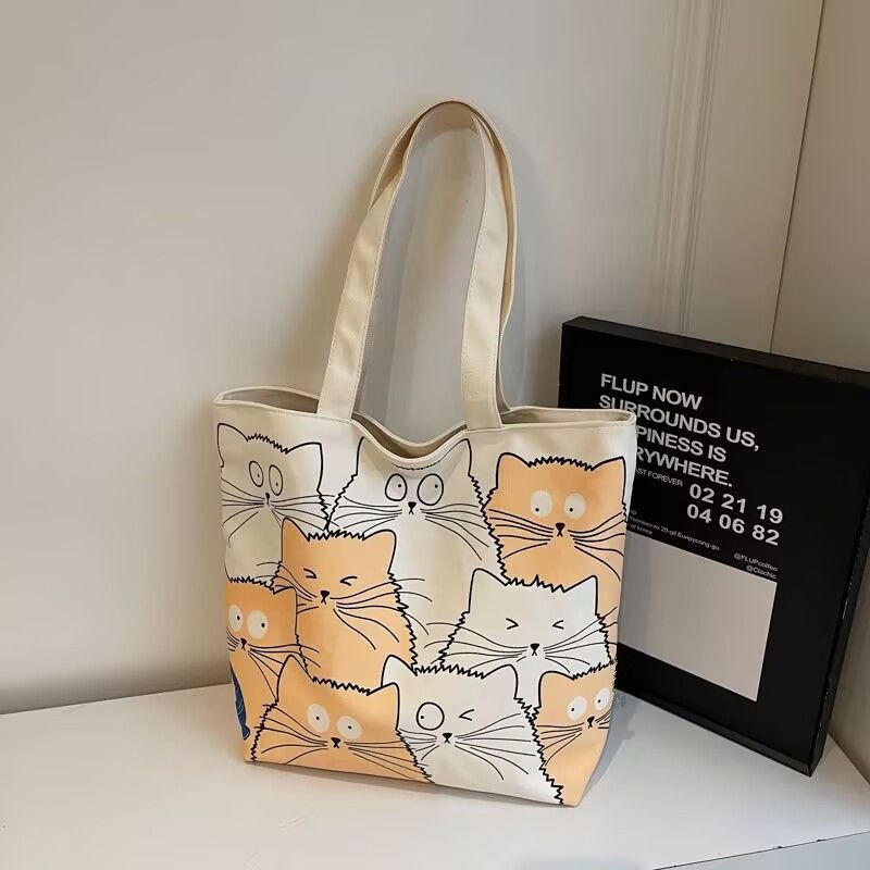Tote bag Large capacity 2025 New style Cute kitten pattern Large capacity Single-shoulder canvas bag Foldable Women Girl Fashion School Shopping Leisure Washable