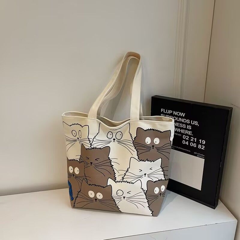 Tote bag Large capacity 2025 New style Cute kitten pattern Large capacity Single-shoulder canvas bag Foldable Women Girl Fashion School Shopping Leisure Washable