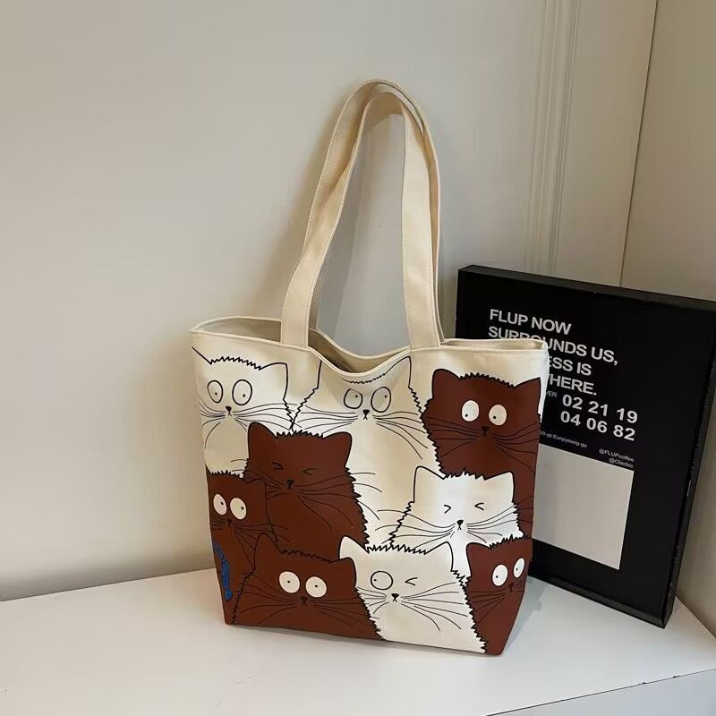 Tote bag Large capacity 2025 New style Cute kitten pattern Large capacity Single-shoulder canvas bag Foldable Women Girl Fashion School Shopping Leisure Washable
