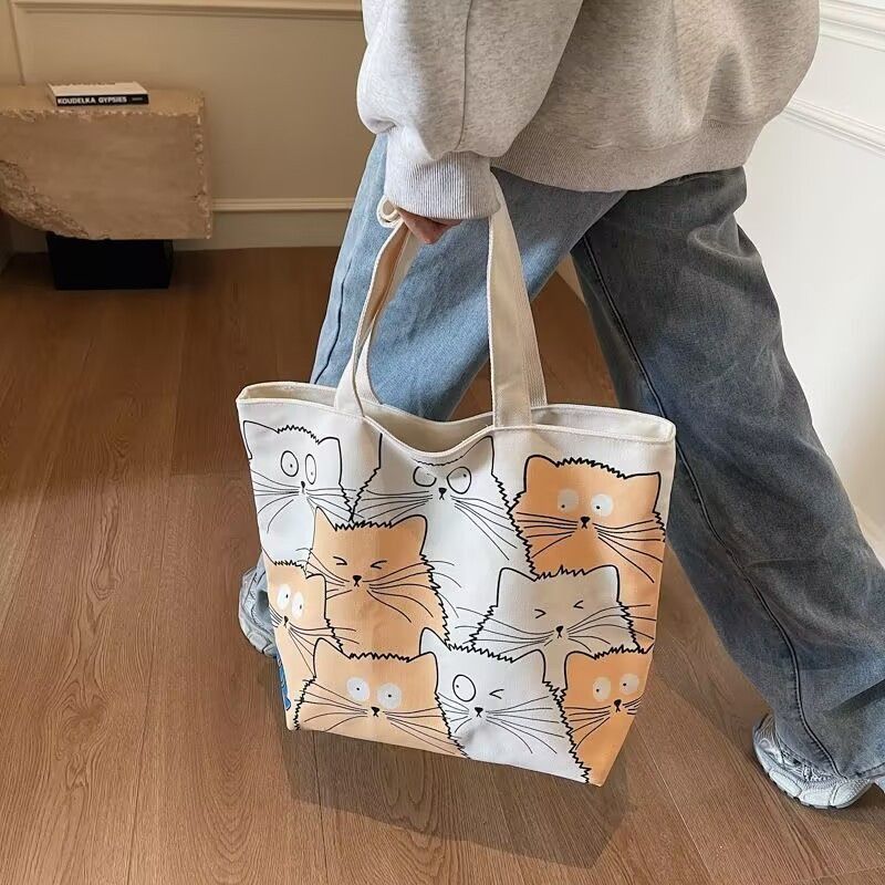 Tote bag Large capacity 2025 New style Cute kitten pattern Large capacity Single-shoulder canvas bag Foldable Women Girl Fashion School Shopping Leisure Washable