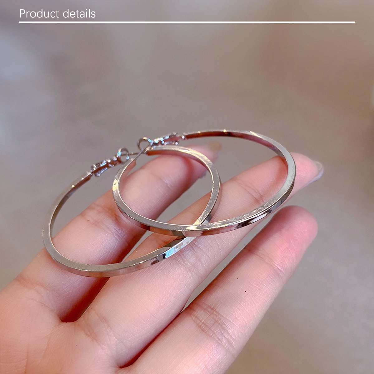 Minimally smooth metal earrings with silver needles, personalized and trendy large circle earrings to enhance facial slimming, suitable for daily travel, weddings, and gatherings