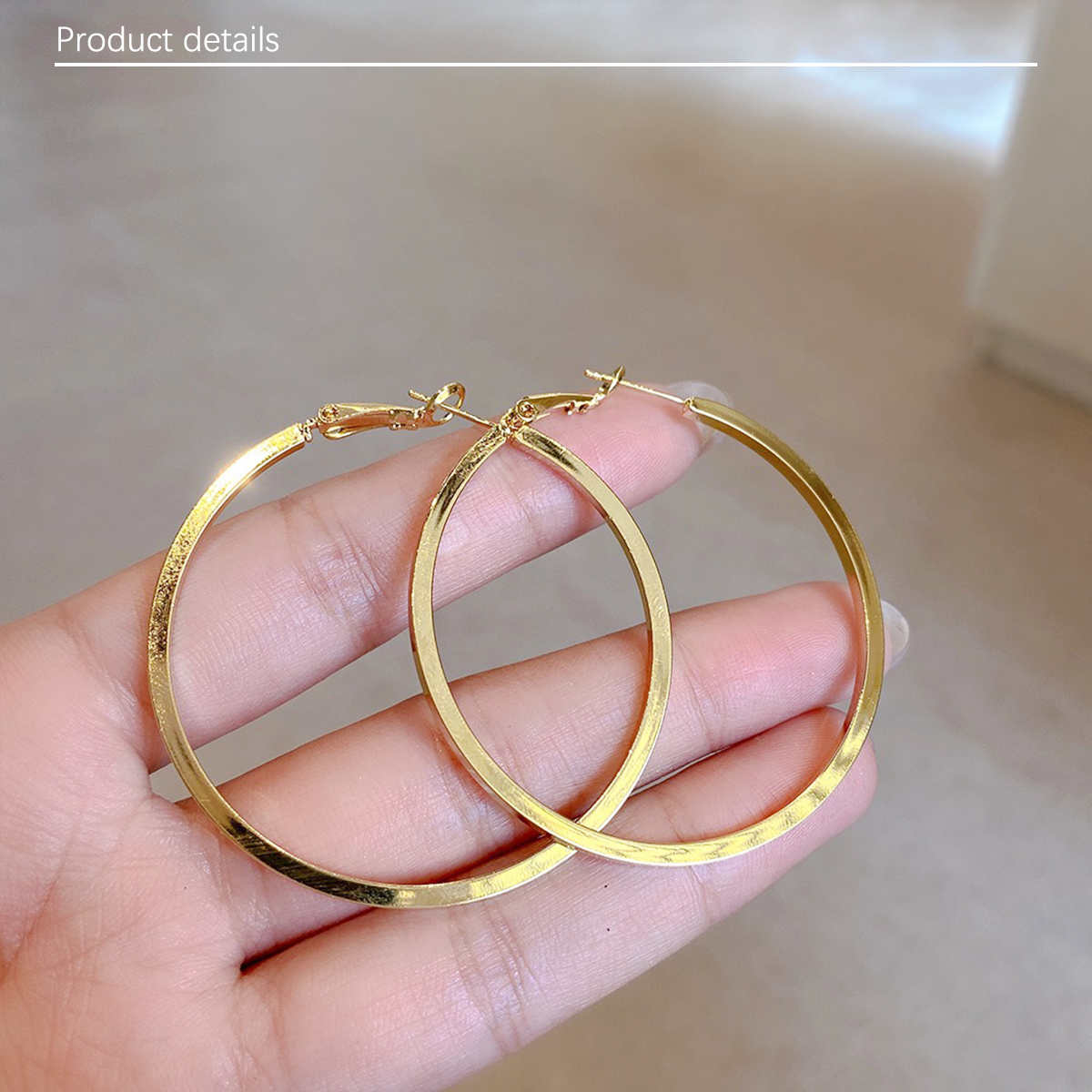 Minimally smooth metal earrings with silver needles, personalized and trendy large circle earrings to enhance facial slimming, suitable for daily travel, weddings, and gatherings