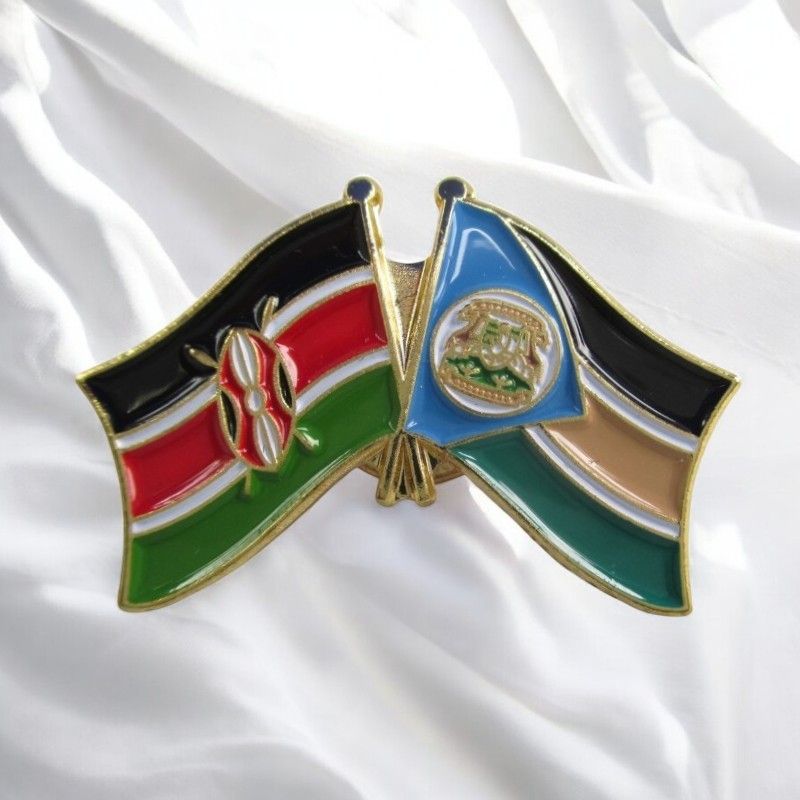 Kenya & County Double Flags Lapel Pin Badge – Elegant Gold-Finished Dual Flag Design for Patriotic & Official Wear
