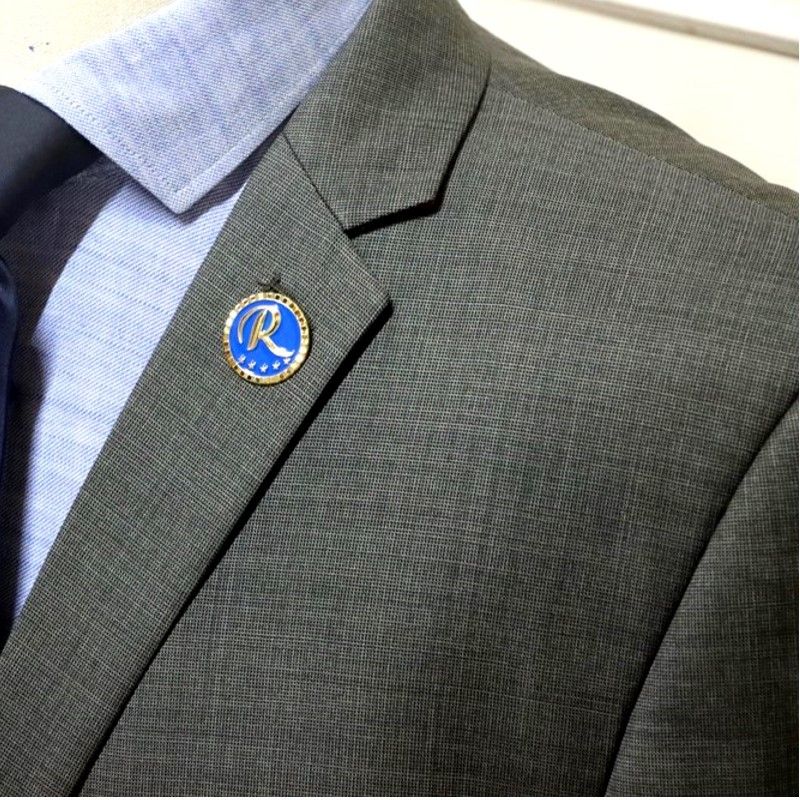 Raila Odinga Lapel Pin Badge – Premium Gold & Blue Political Memorabilia Pin with Iconic “R” and Star Design – Collectible & Stylish Accessory for Supporters & Enthusiasts
