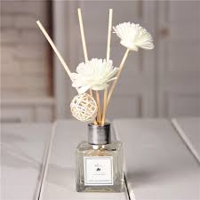 REED DIFFUSER/ home decor/ decor accents/ 3 reed sticks and a flower-refillable with essential oils of your choice