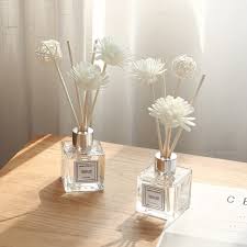 REED DIFFUSER/ home decor/ decor accents/ 3 reed sticks and a flower-refillable with essential oils of your choice
