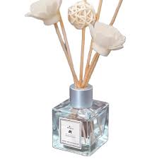 REED DIFFUSER/ home decor/ decor accents/ 3 reed sticks and a flower-refillable with essential oils of your choice