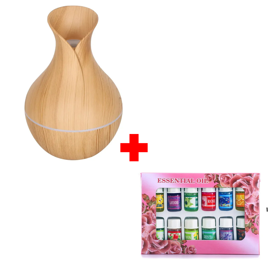 USB Aromatherapy Ultrasonic Humidifier and Scent Diffuser + 12pcs Different Scented Essential Oils. Keep the air moist and your home smelling lovely all at once!