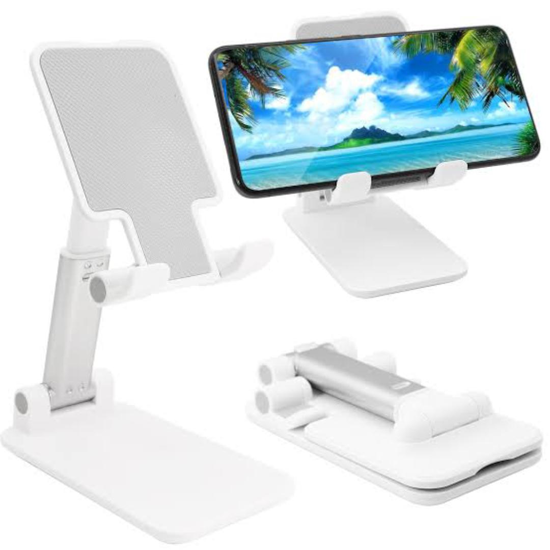 BRAND NEW FOLDABLE DESKTOP PHONE STAND HOLDER WHITE IN COLOR WITH A RUBBER HOLDER