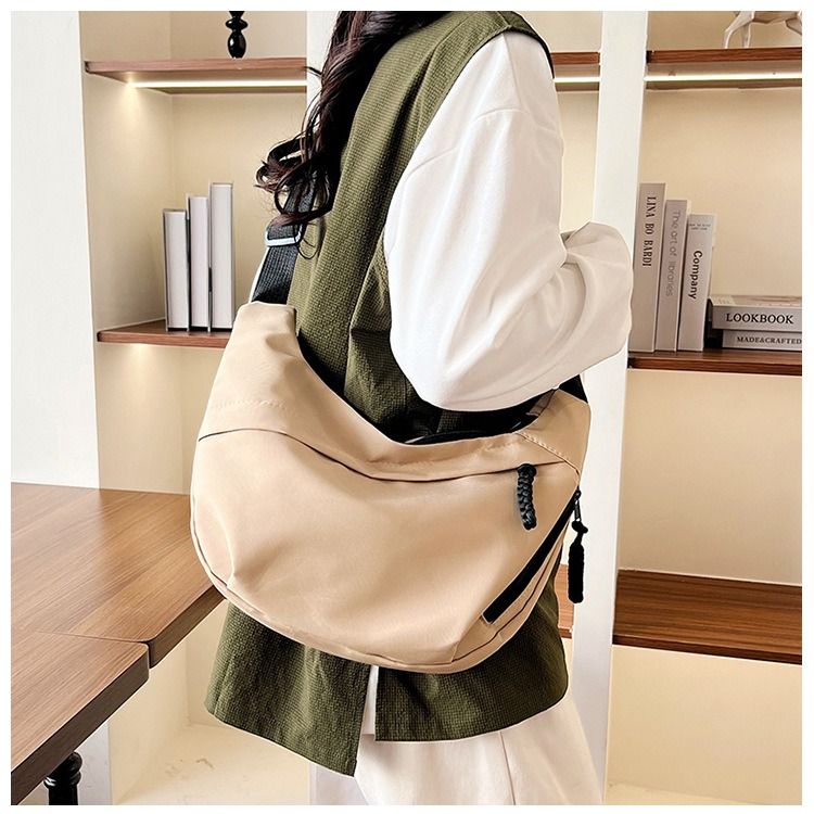 2024 Cross-border women's bag simple fashion dumpling bag lightweight large capacity crossbody bag students every class shoulder bag