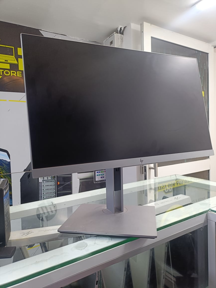 The HP EliteDisplay E243 is a sleek, high-performance 23.8-inch Full HD monitor, designed for productivity and comfort. With ultra-thin bezels and a 3-sided micro-edge display, it offers a seamless