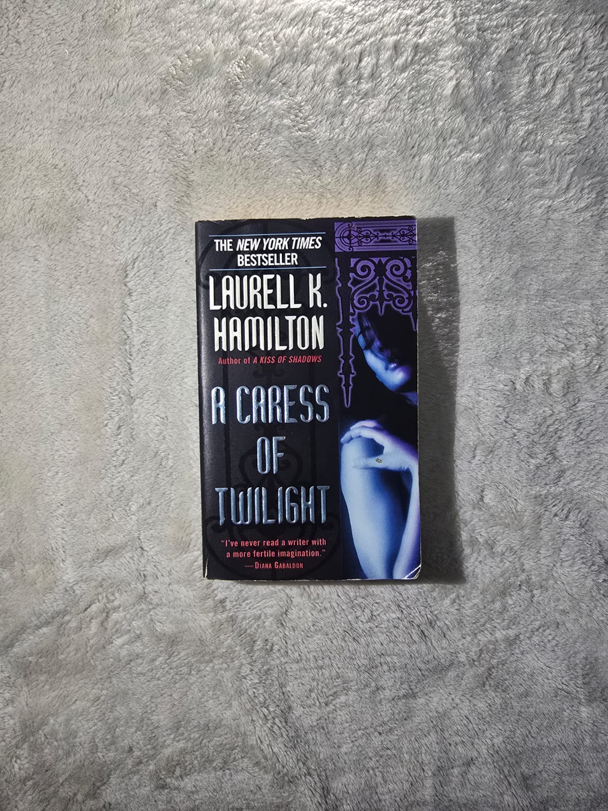 Paranormal Romance by Laurell K. Hamilton – Kiss the Dead & A Caress of Twilight | Preowned Pocket NovelsStep into a world of vampires, magic, and steamy intrigue with this 2-in-1 pocket-sized collect
