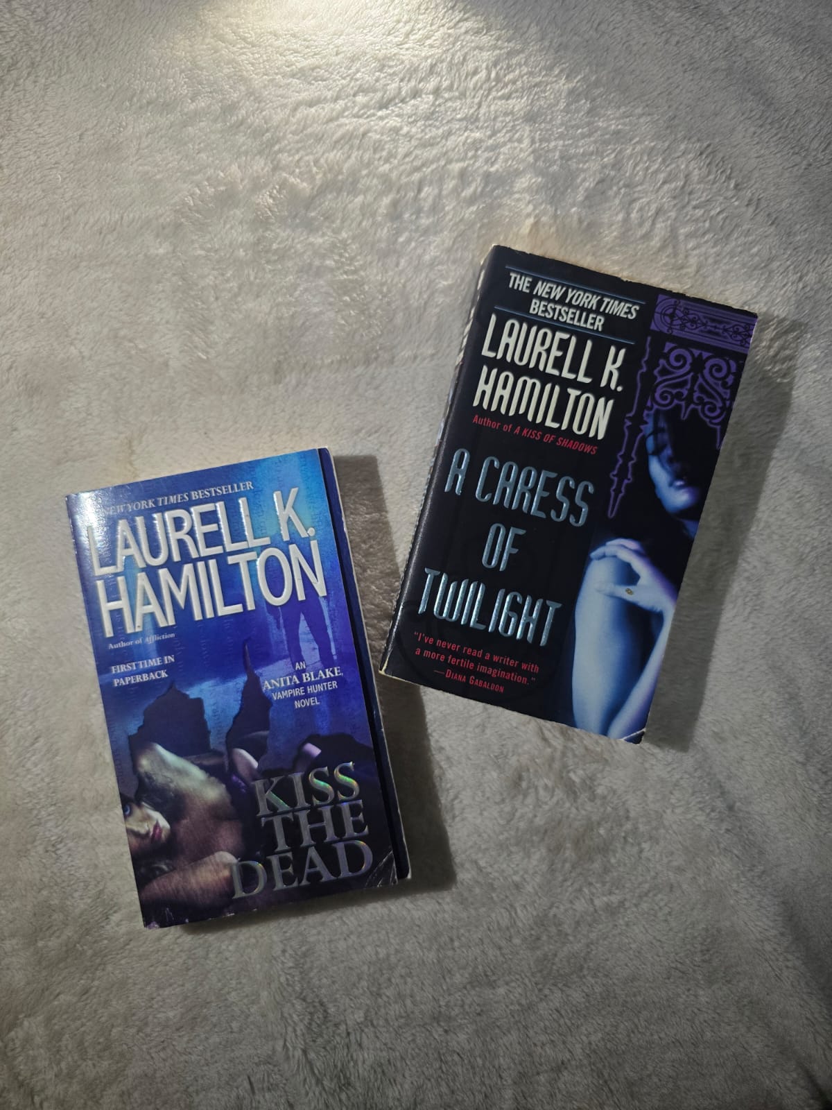 Paranormal Romance by Laurell K. Hamilton – Kiss the Dead & A Caress of Twilight | Preowned Pocket NovelsStep into a world of vampires, magic, and steamy intrigue with this 2-in-1 pocket-sized collect