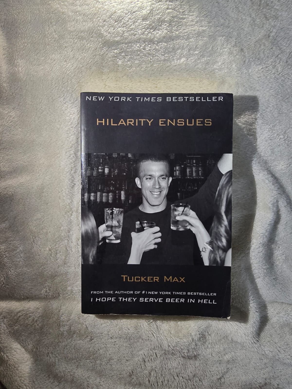 Hilarity Ensues – Preowned memoir novel  by Tucker Max (Humor / Non‑Fiction)