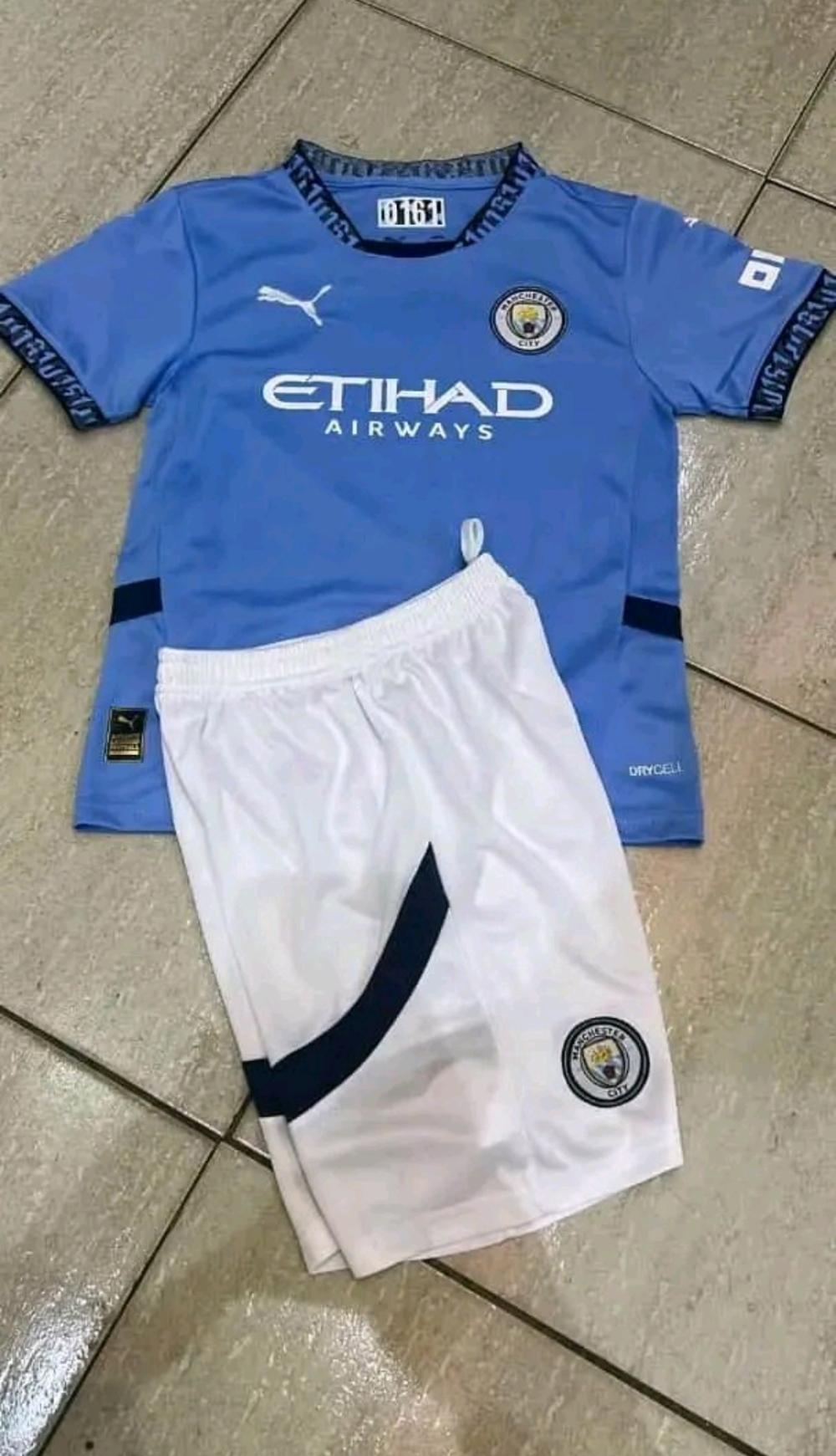 NEW ARRIVALS KIDS JERSEY, 2024/25 MANCHESTER CITY  AND A PAIR IF SHORTS
