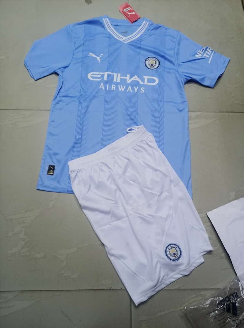 NEW ARRIVALS KIDS JERSEY, 2024/25 MANCHESTER CITY  AND A PAIR IF SHORTS