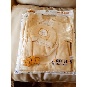 Lucky Star 11 Pieces Unisex New Born Baby Receiving Set is the perfect starter kit for new parents, providing all the essentials to keep your baby comfortable, cozy, and stylish