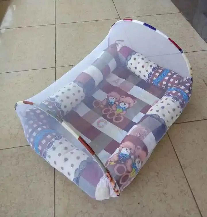 CLEARANCE OFFER Baby Nest & Co-sleeper Foldable + Pillow+ Net Assorted Prints- This cozy and versatile baby nest is designed to provide a safe, comfortable sleep coming both boys theme and girls theme