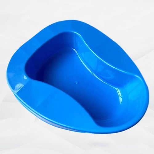 Medical Adorned Plastic Bedpan Bed Pans Multipurpose Easy Use.  A plastic bedpan Is a container used to collect urine and feaces from a person who cannot get out of the bed.