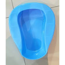 Medical Adorned Plastic Bedpan Bed Pans Multipurpose Easy Use.  A plastic bedpan Is a container used to collect urine and feaces from a person who cannot get out of the bed.
