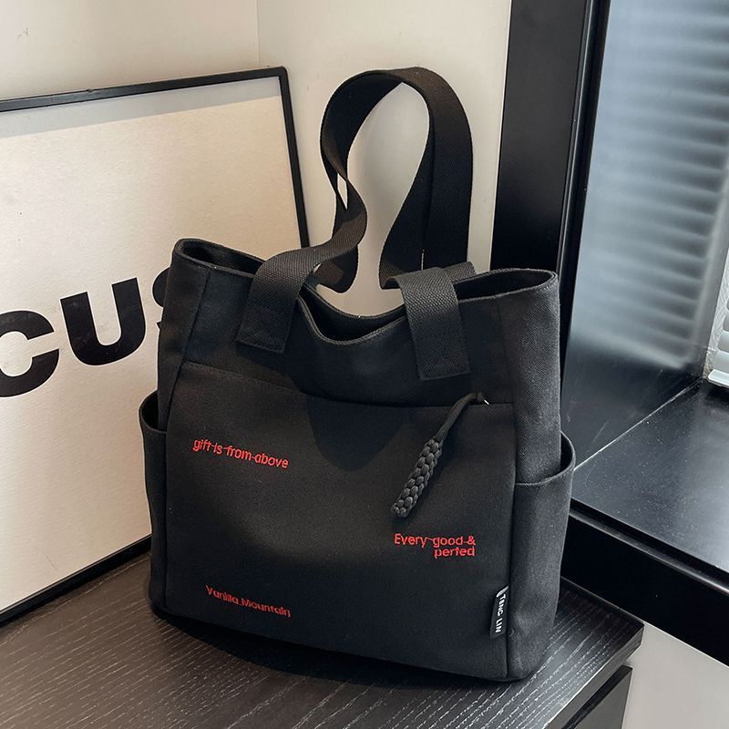 【Good Quality】Canvas bag women's men's new trendy embroidery letter handbag student large capacity single shoulder tote bag office commuter crossbody bag