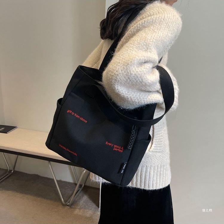 【Good Quality】Canvas bag women's men's new trendy embroidery letter handbag student large capacity single shoulder tote bag office commuter crossbody bag