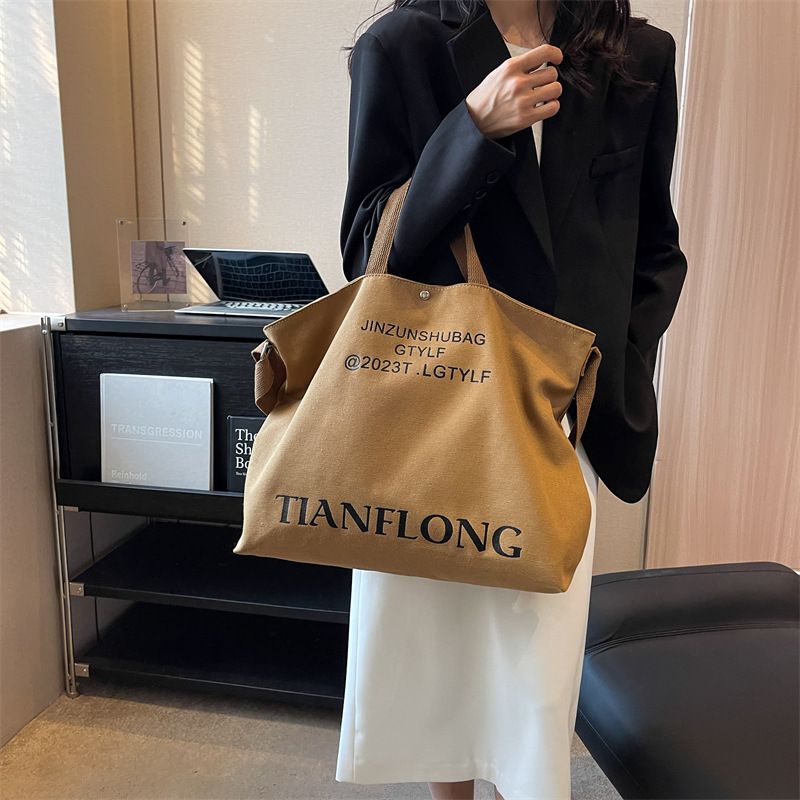Casual shoulder crossbody bag for women commuting, large capacity student handbag, simple and lazy style, women's canvas tote bag