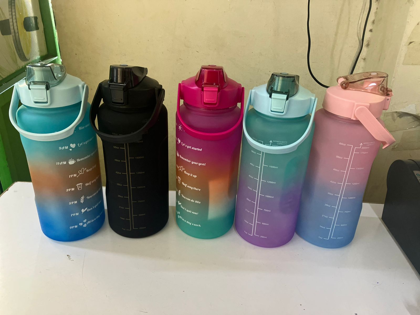 3 in 1 Motivational water bottle ✅2000ml✅ 900ml✅300ml
with time stamps, leak proof cup with straw and safety lock, adjustable strap.