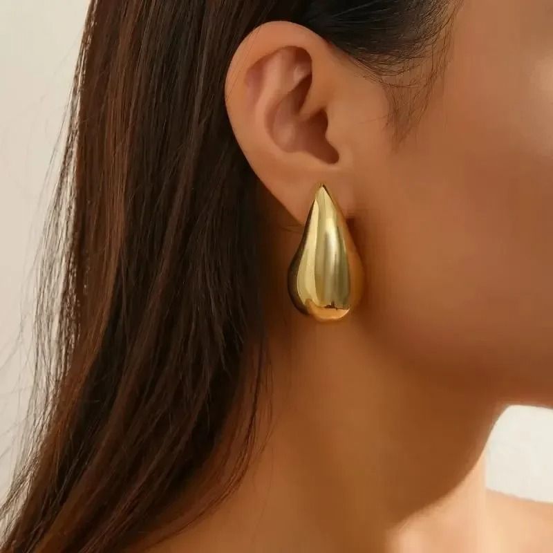 BUY ONE GET ONE FREE .WATER DROP - 18K Gold / Silver Hoop Earrings. One Gold set and one Silver set.