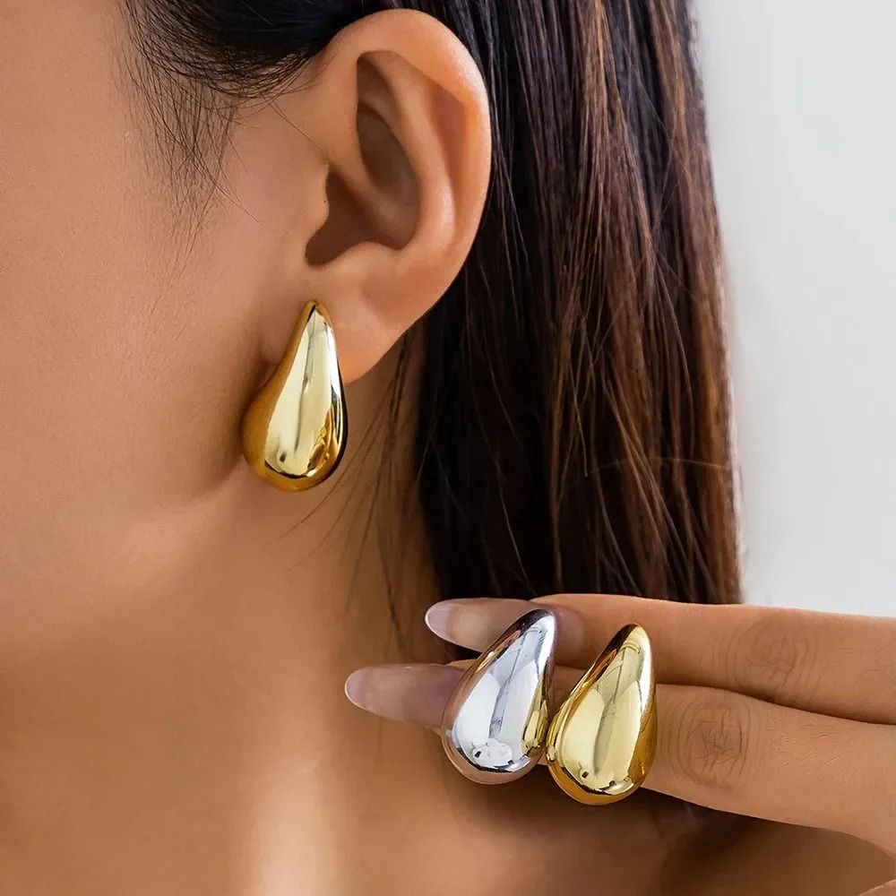 BUY ONE GET ONE FREE .WATER DROP - 18K Gold / Silver Hoop Earrings. One Gold set and one Silver set.