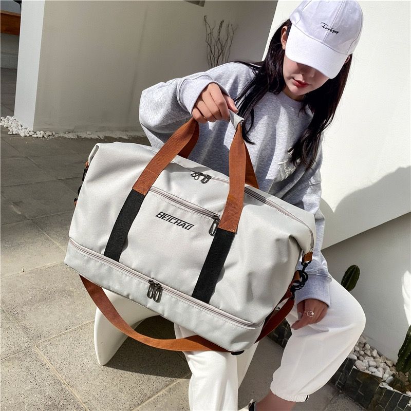 Extra-large capacity, multi-functional travel bag and gym bag with wet and dry separation. It can be used as a yoga shoulder crossbody duffel bag, suitable for both men and women as a casual bag