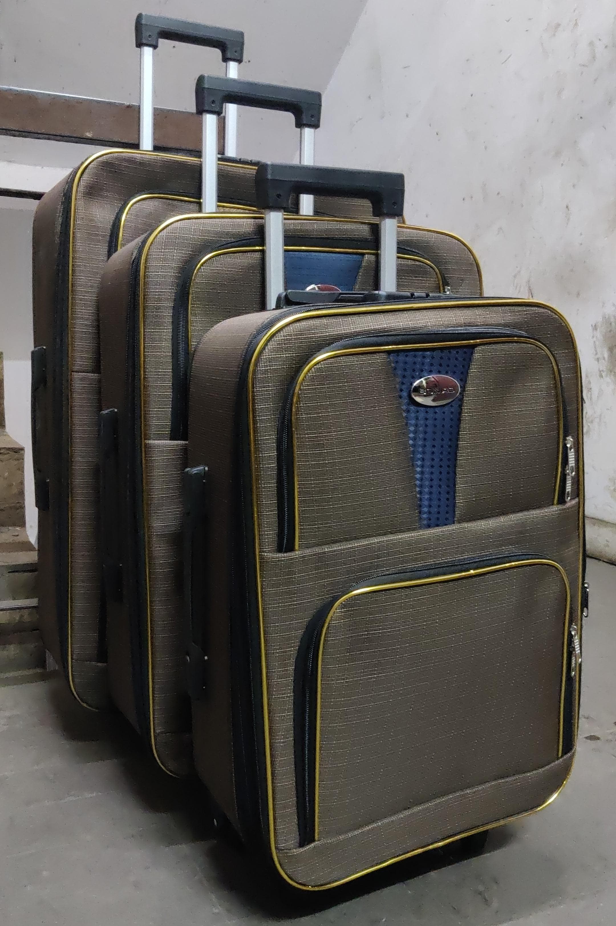 3 in 1 Pioneer traveling bag suitcase  Stylish travel suitcase made from durable fabric. It comes with a set of 180-degree wheels for convenient movement.