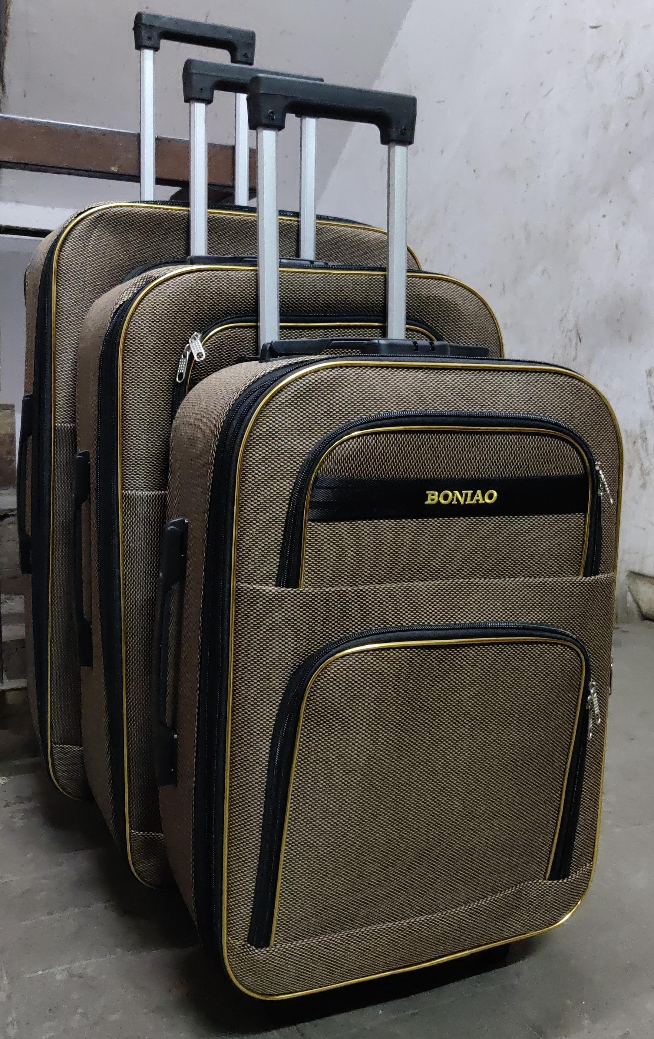 3 in 1 Pioneer traveling bag suitcase  Stylish travel suitcase made from durable fabric. It comes with a set of 180-degree wheels for convenient movement.