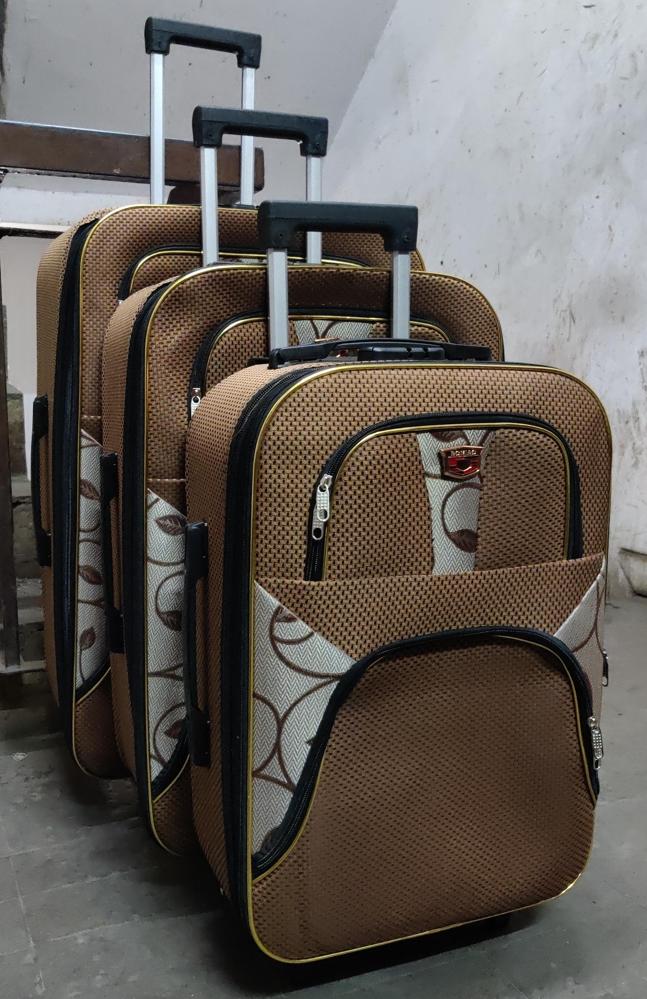 3 in 1 Pioneer traveling bag suitcase  Stylish travel suitcase made from durable fabric. It comes with a set of 180-degree wheels for convenient movement.
