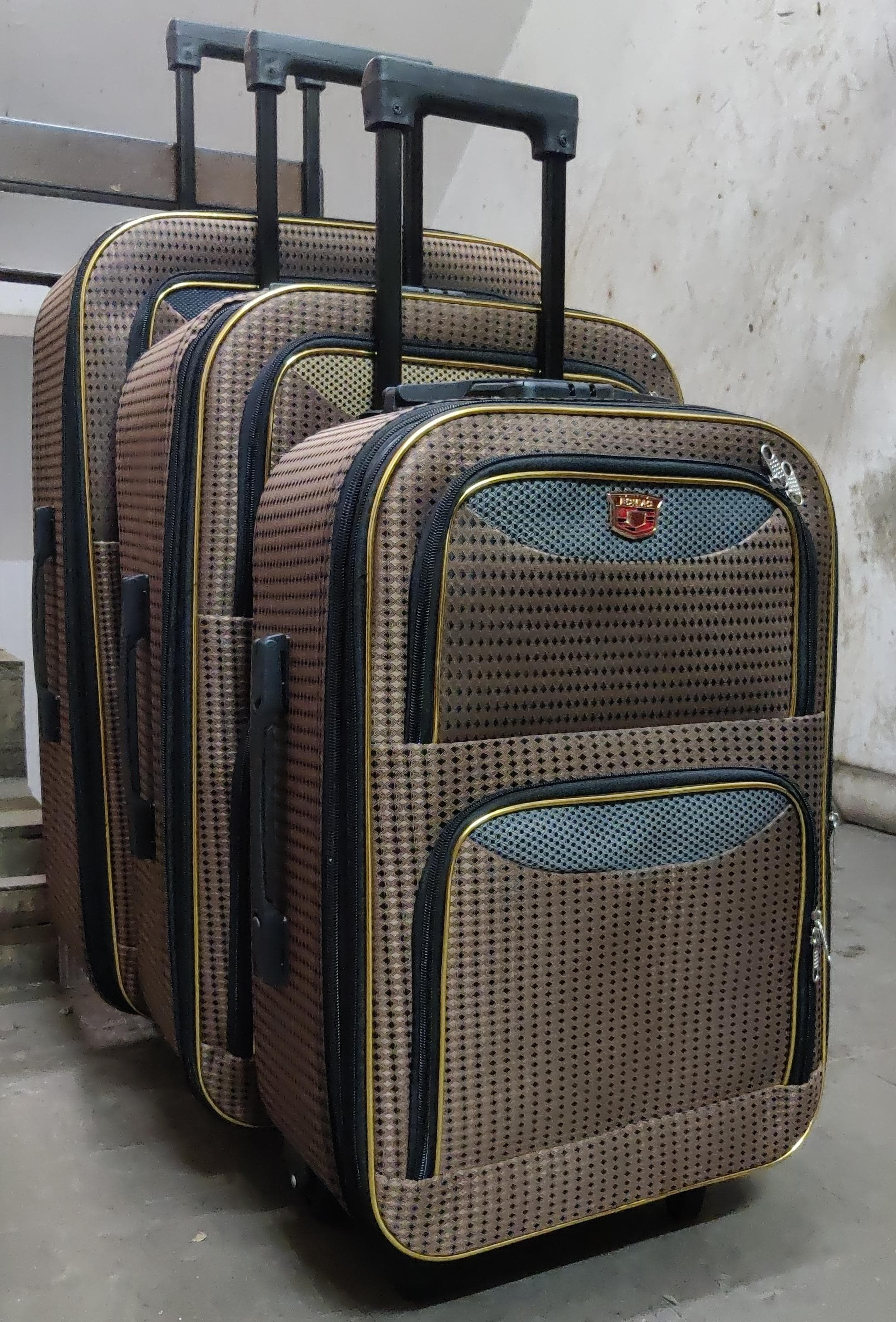 3 in 1 Pioneer traveling bag suitcase  Stylish travel suitcase made from durable fabric. It comes with a set of 180-degree wheels for convenient movement.