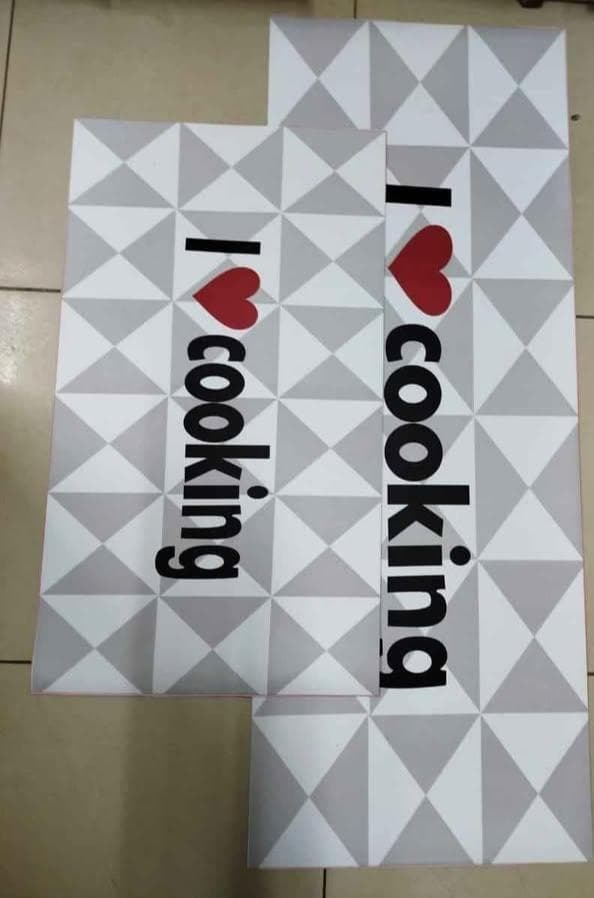 2 PC KITCHEN MATS RUBBER BOTTOM  This kitchen mat is a stylish and practical addition to any home. Its durable material provides comfort while standing, making it perfect for your kitchen, laundry roo