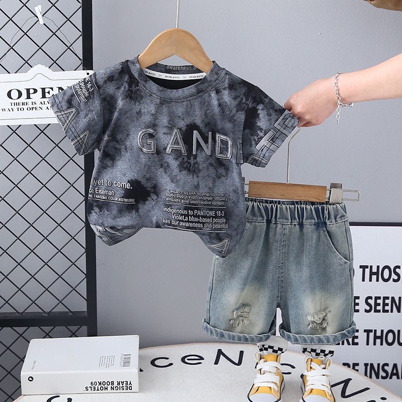 Summer new boys' two-piece set children's summer clothing tie dye letter short sleeved+ripped denim shorts set trendy