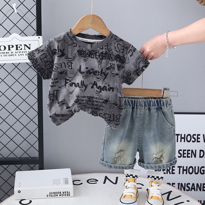 Summer new boys' two-piece set children's summer clothing tie dye letter short sleeved+ripped denim shorts set trendy
