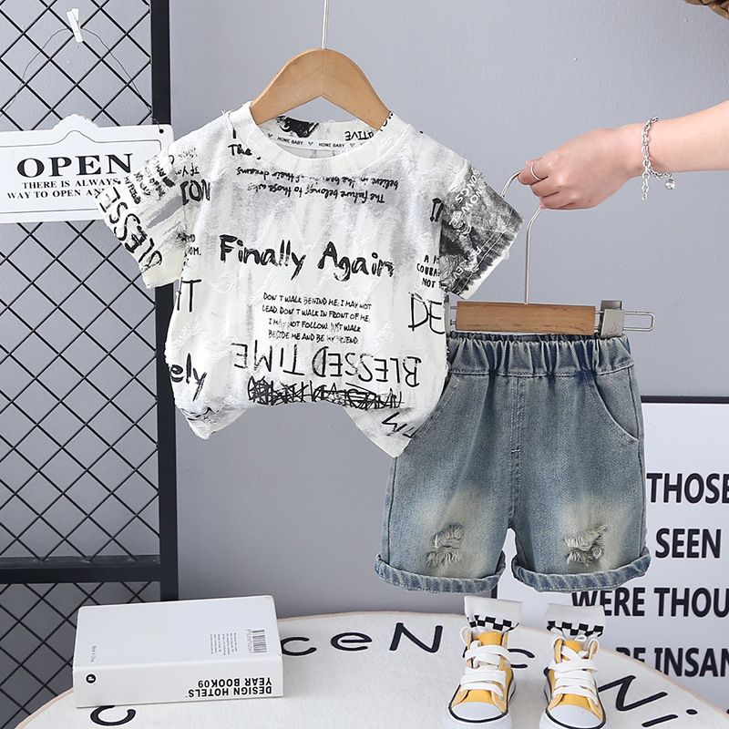 Summer new boys' two-piece set children's summer clothing tie dye letter short sleeved+ripped denim shorts set trendy