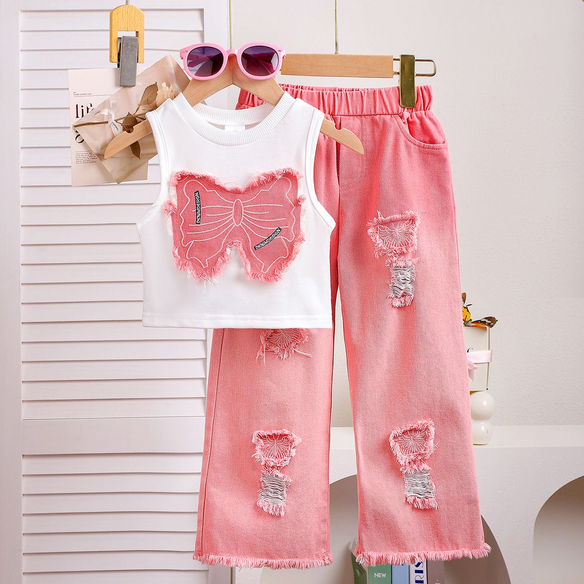 Girls' clothing set European and American summer girls' sleeveless patchwork bow top, ripped denim pants two-piece set